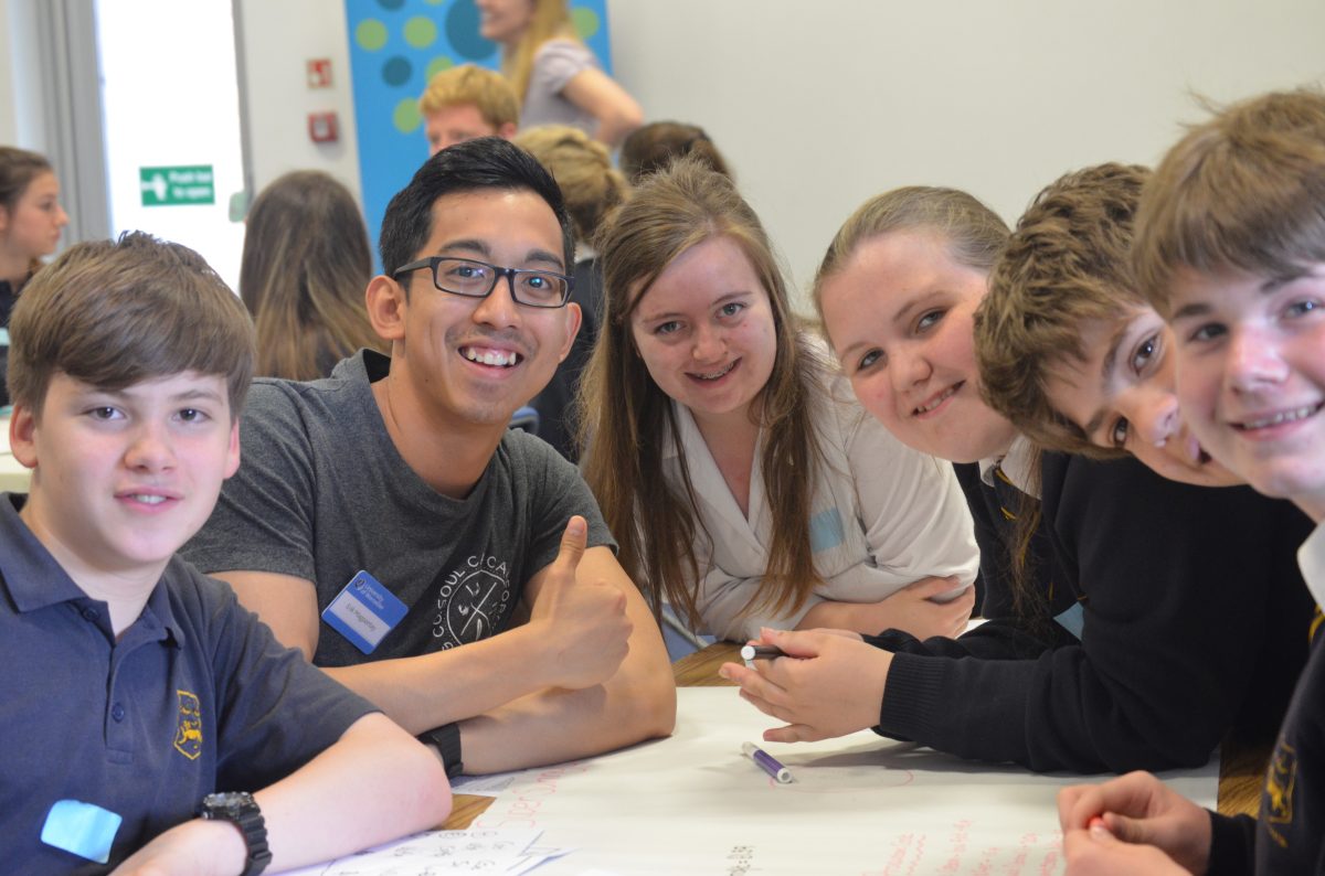 One of the University or Worcester's student Mentor's Eric, working with pupils at the skills for tomorrow food workshop.